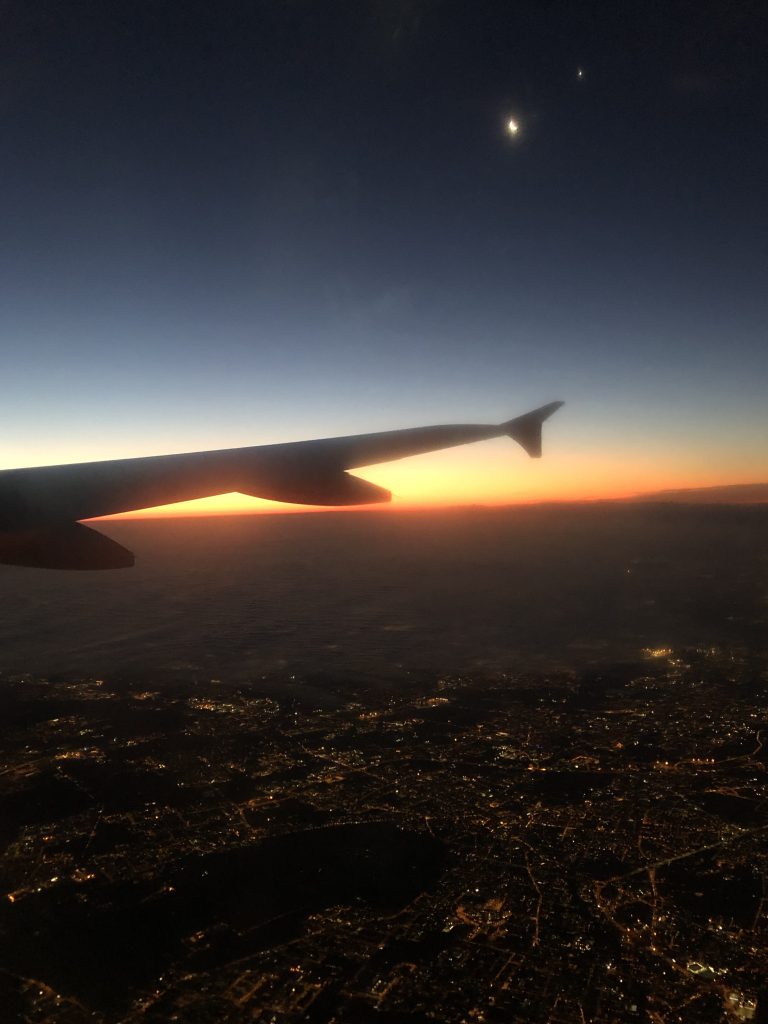 Volare sopra la mia città al tramonto