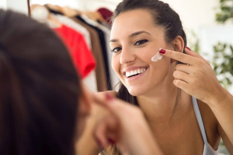 beautiful-young-woman-caring-her-skin-near-mirror-bathroom.jpg